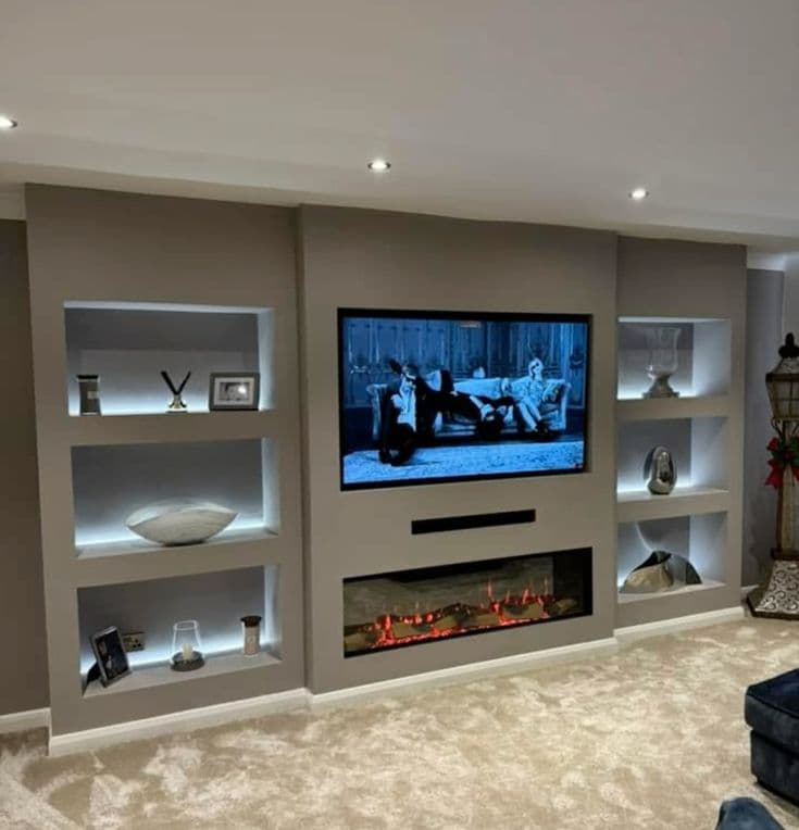 Modern media wall with linear fireplace and ambient shelf lighting - professional installation South Yorkshire