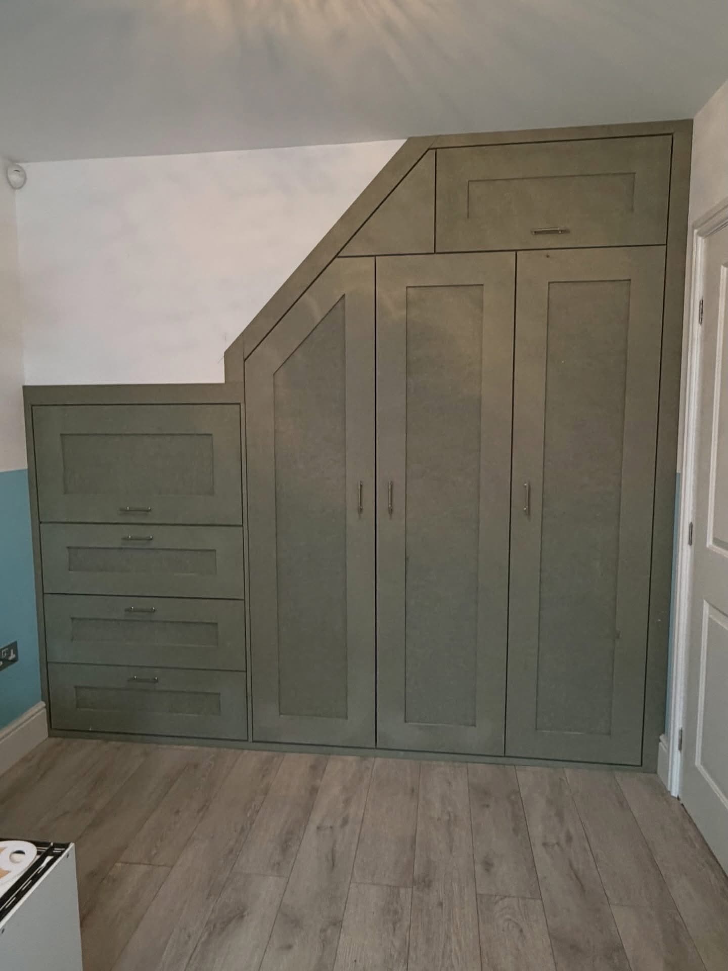 Fitted wardrobe under stairs storage